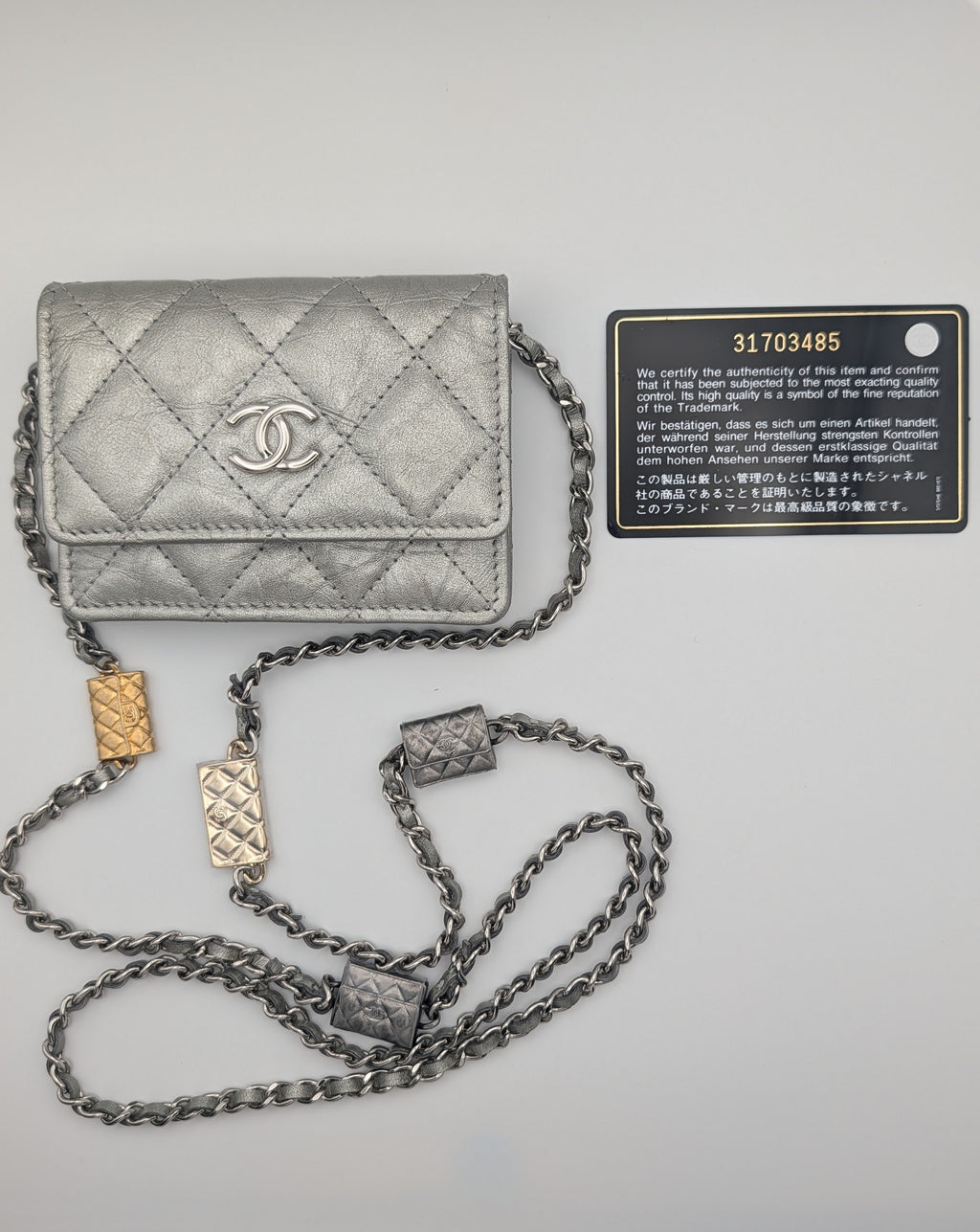 Chanel Metallic Silver Quilted Mini Bag with Limited Edition Charms