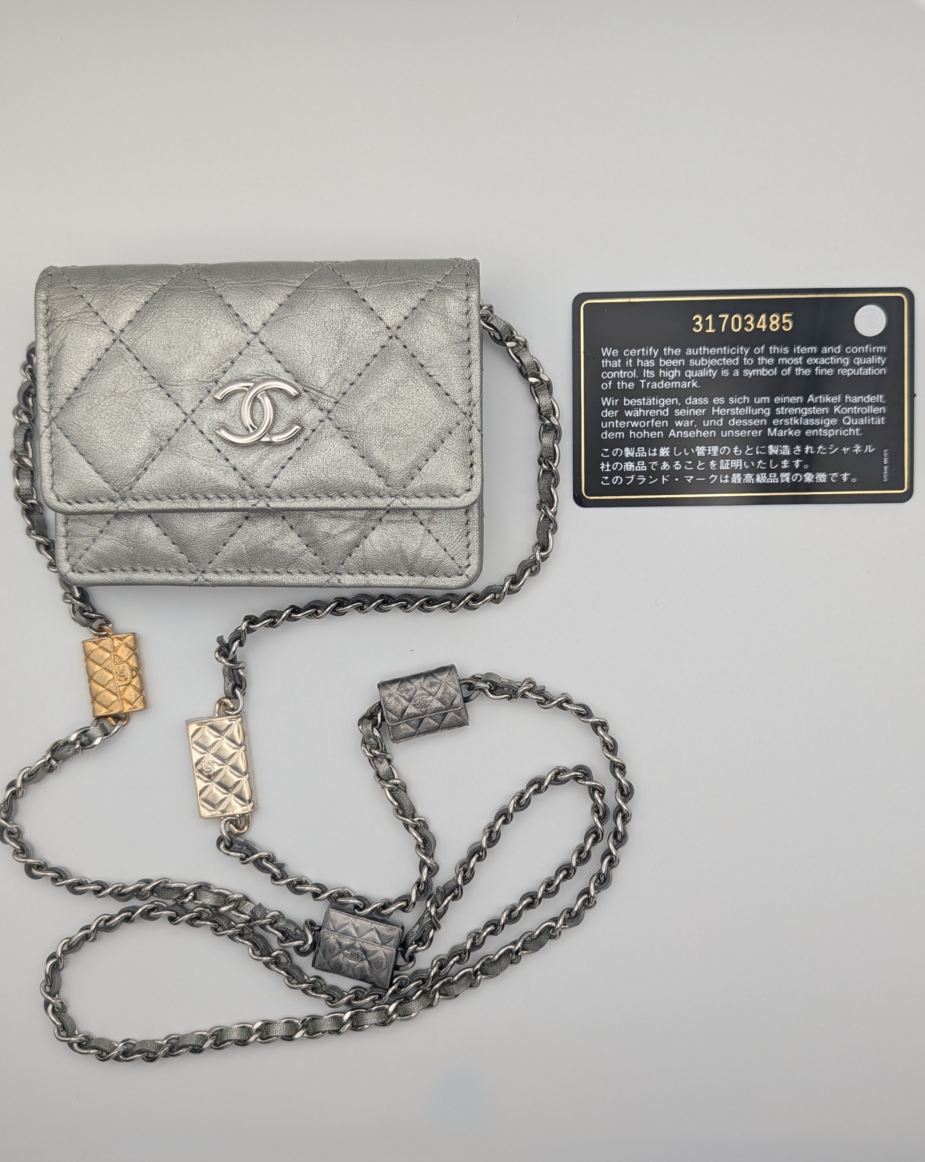 Chanel Metallic Silver Quilted Mini Bag with Limited Edition Charms